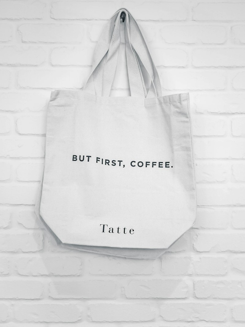 Plain white canvas tote bag ready for custom embroidery