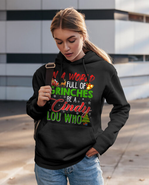 2020-11-Women-Hoodie-In-A-World-Full-Of-Grinches-Be-A-Cindy-Lou-Who-Mockup2-Black.jpg